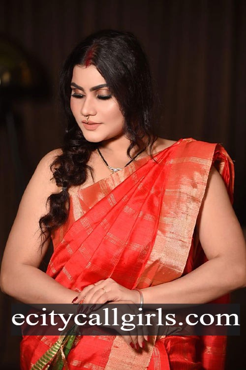 Jyothika in a red and gold silk saree with a braided hairstyle, call girl in Electronic City Bangalore